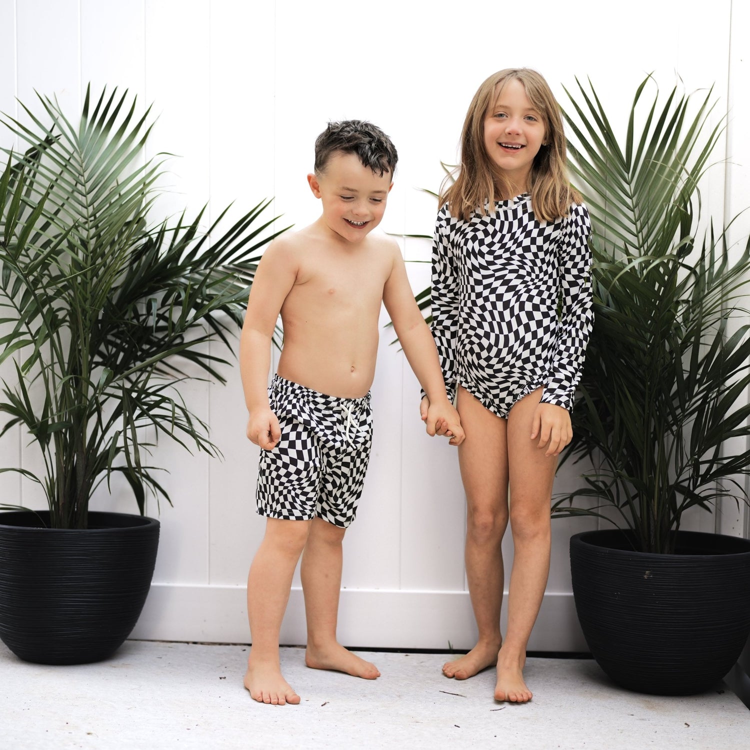 RUFFLE RASH GUARD - Black Dizzy Check - Tenth &amp; Pine - Ruffle Rash Guard - 6/12m - millie + roo