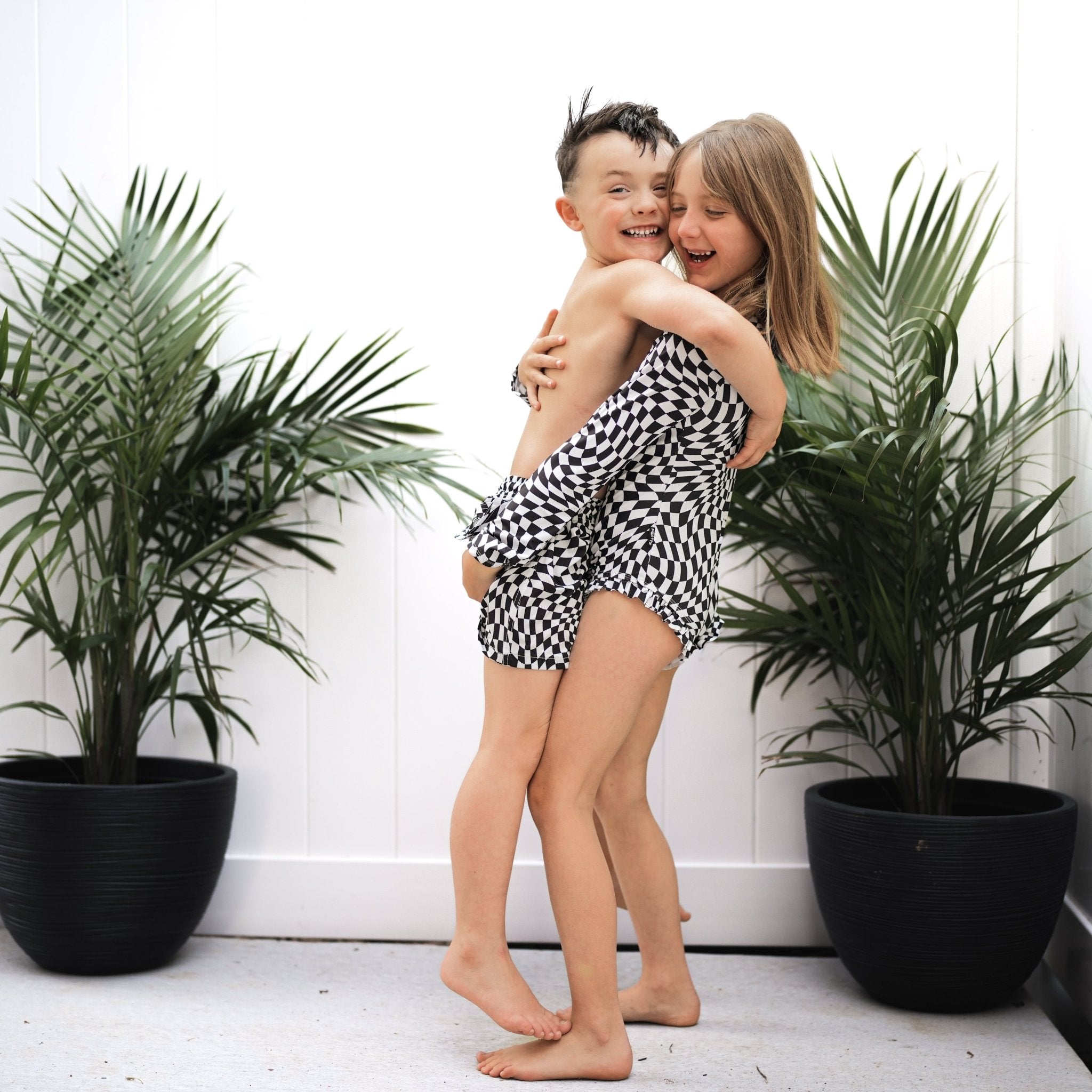 RUFFLE RASH GUARD - Black Dizzy Check - Tenth &amp; Pine - Ruffle Rash Guard - 6/12m - millie + roo