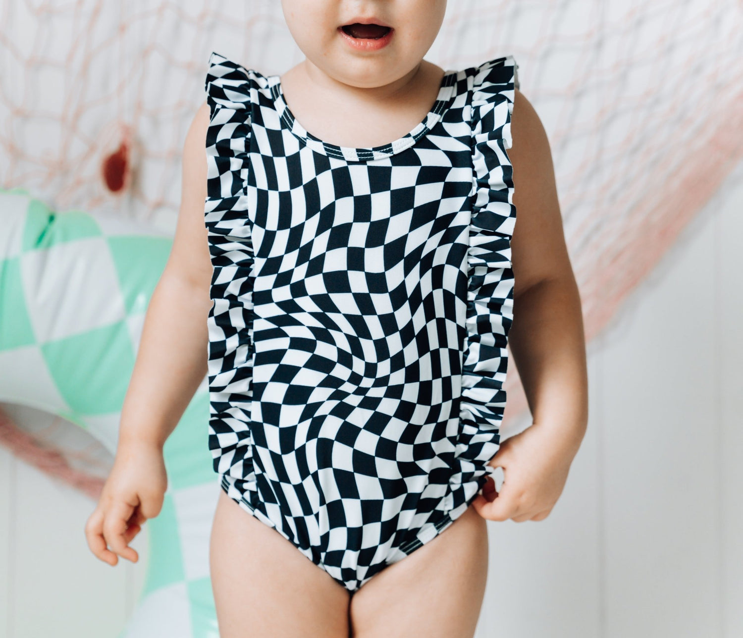 RUFFLE SWIMSUIT - Black Dizzy Check - Tenth &amp; Pine - Ruffle Swimsuit - 6/12m - millie + roo